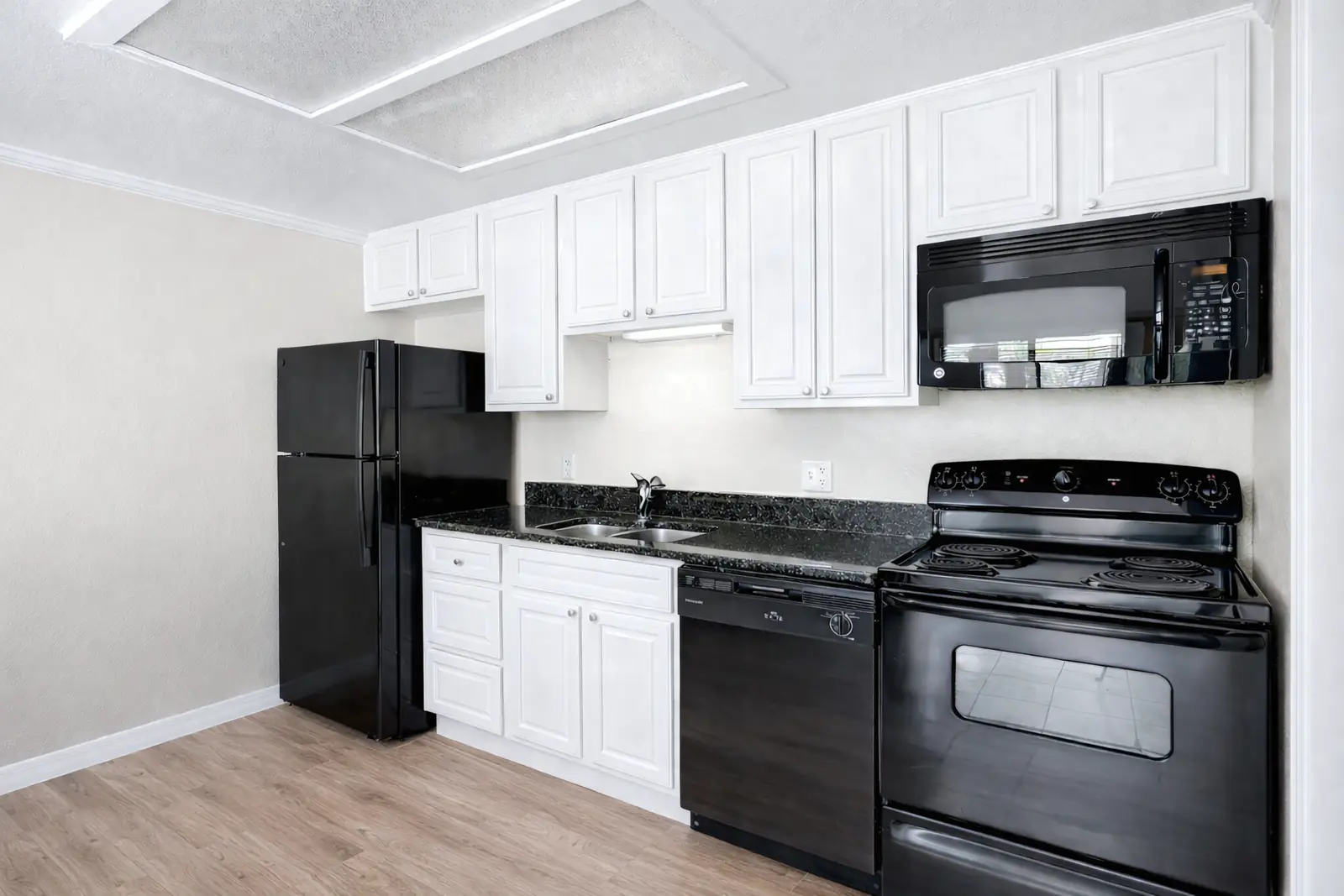 Open kitchen and living space inside a bungalow.